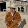 1970’s Fringe with a Shed Horn Button Brown Jacket